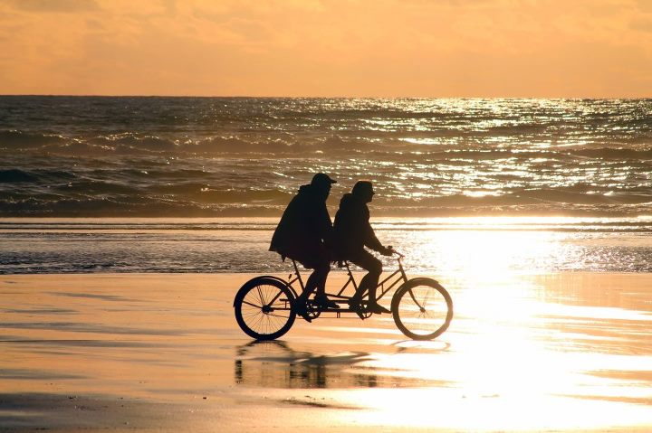 Tandem bicycle on the beach